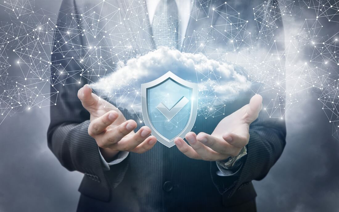 a confident professional balances the weight of cloud technology and protection