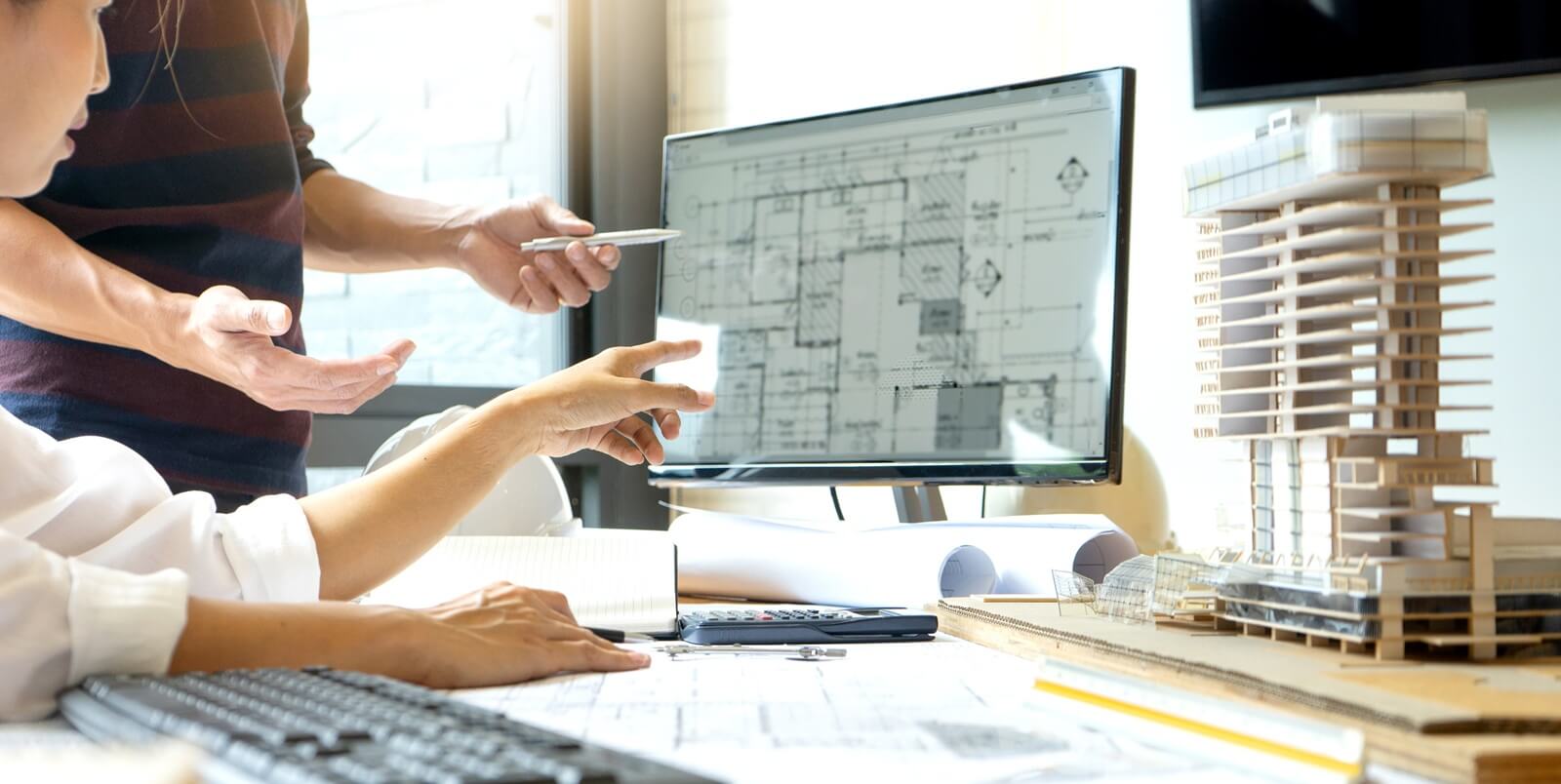 engineer or architectural project, two engineering or architecture discussing and working on blueprint with architect equipment