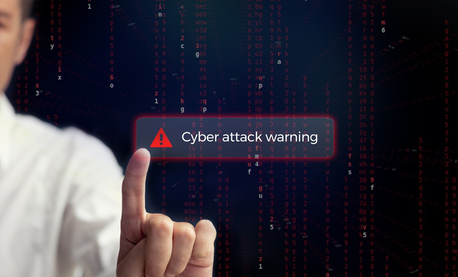 man securing computer data base by pressing alert sign for cyber attack on digital display