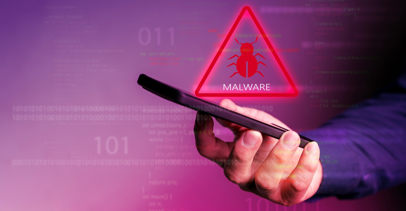 Hacker in hoodie dark theme Hacker in a blue hoody standing in f