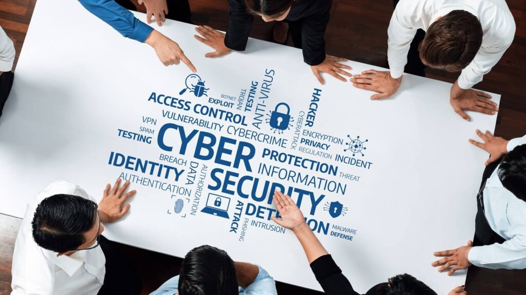 diverse team engages in a cybersecurity strategy meeting, analyzing crucial terms and concepts related to modern digital security threats and effective protection measures