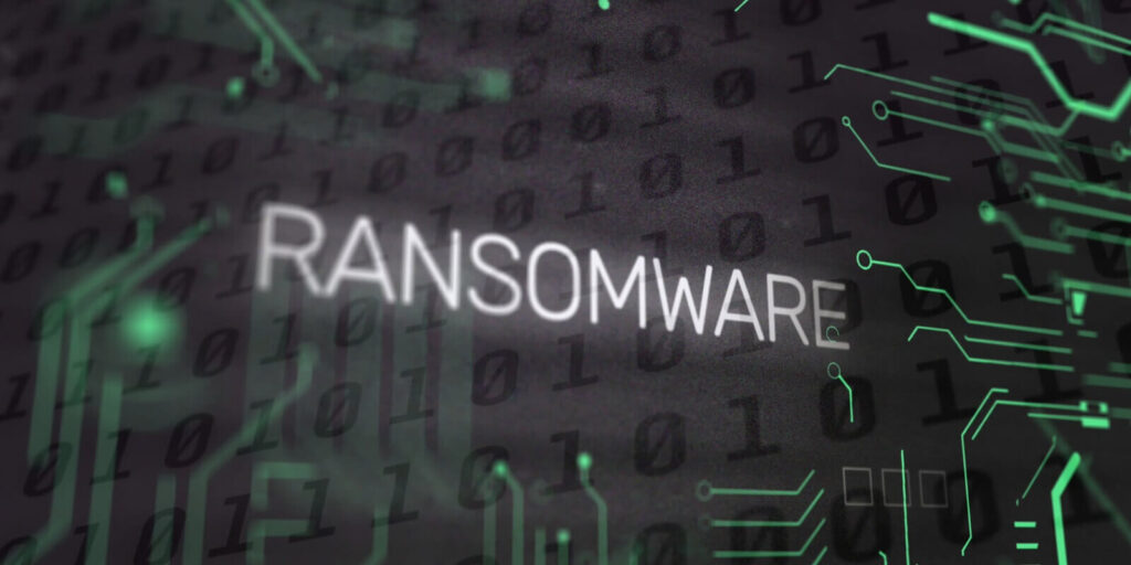 ransomware text and binary coding data processing over computer motherboard