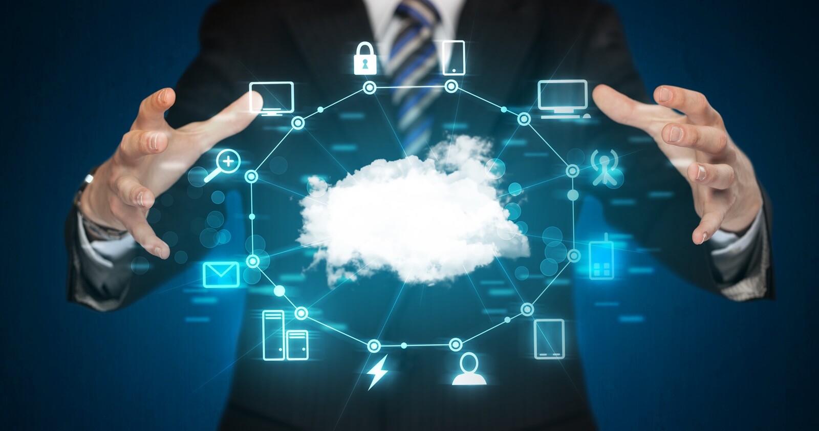 businessman holding digital icons