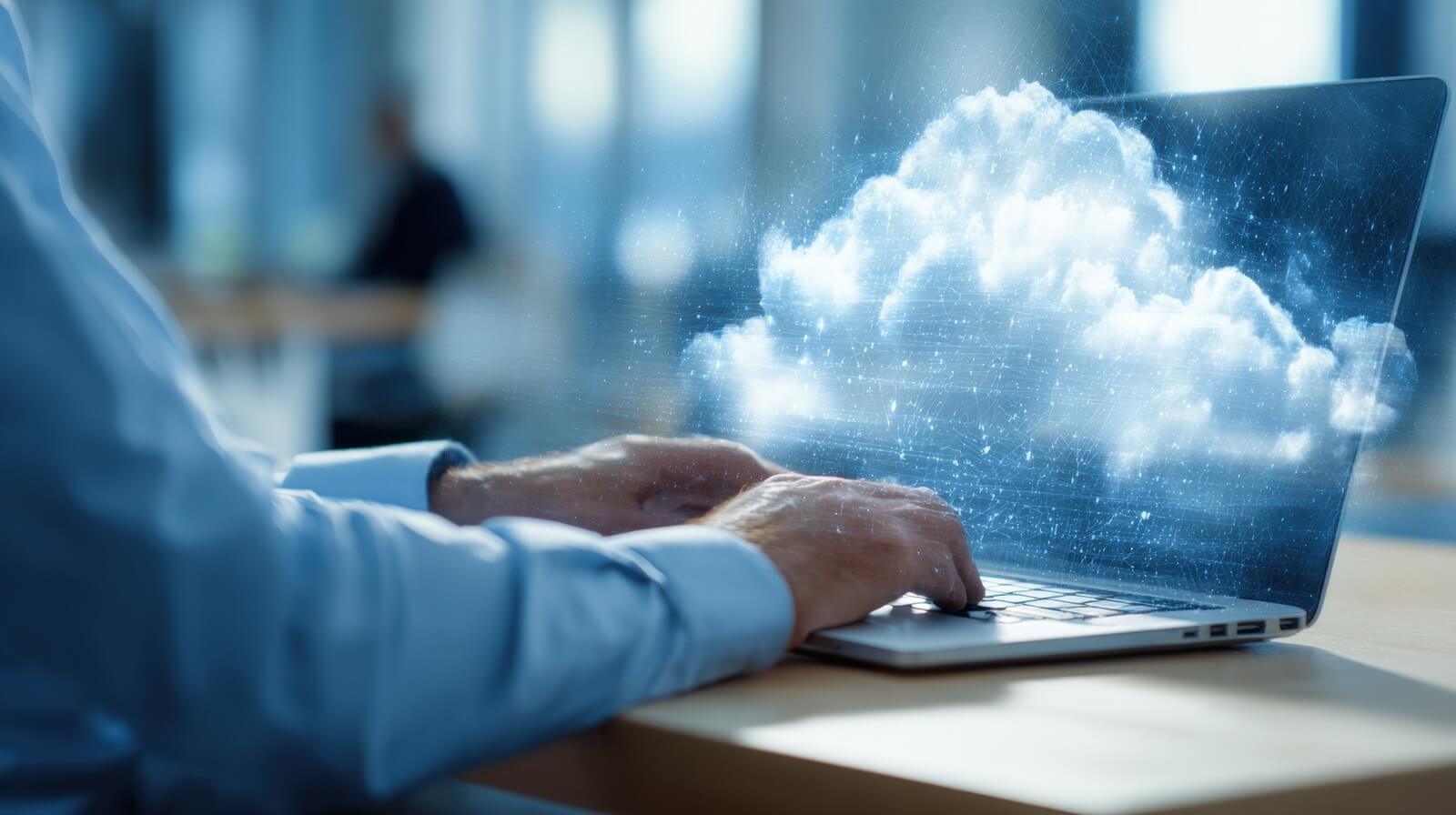 professional working on a laptop in a modern office analyzing cloud computing solutions