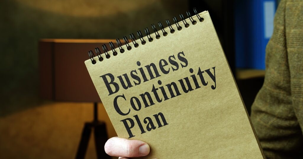 the man shows business continuity plan bcp in the office