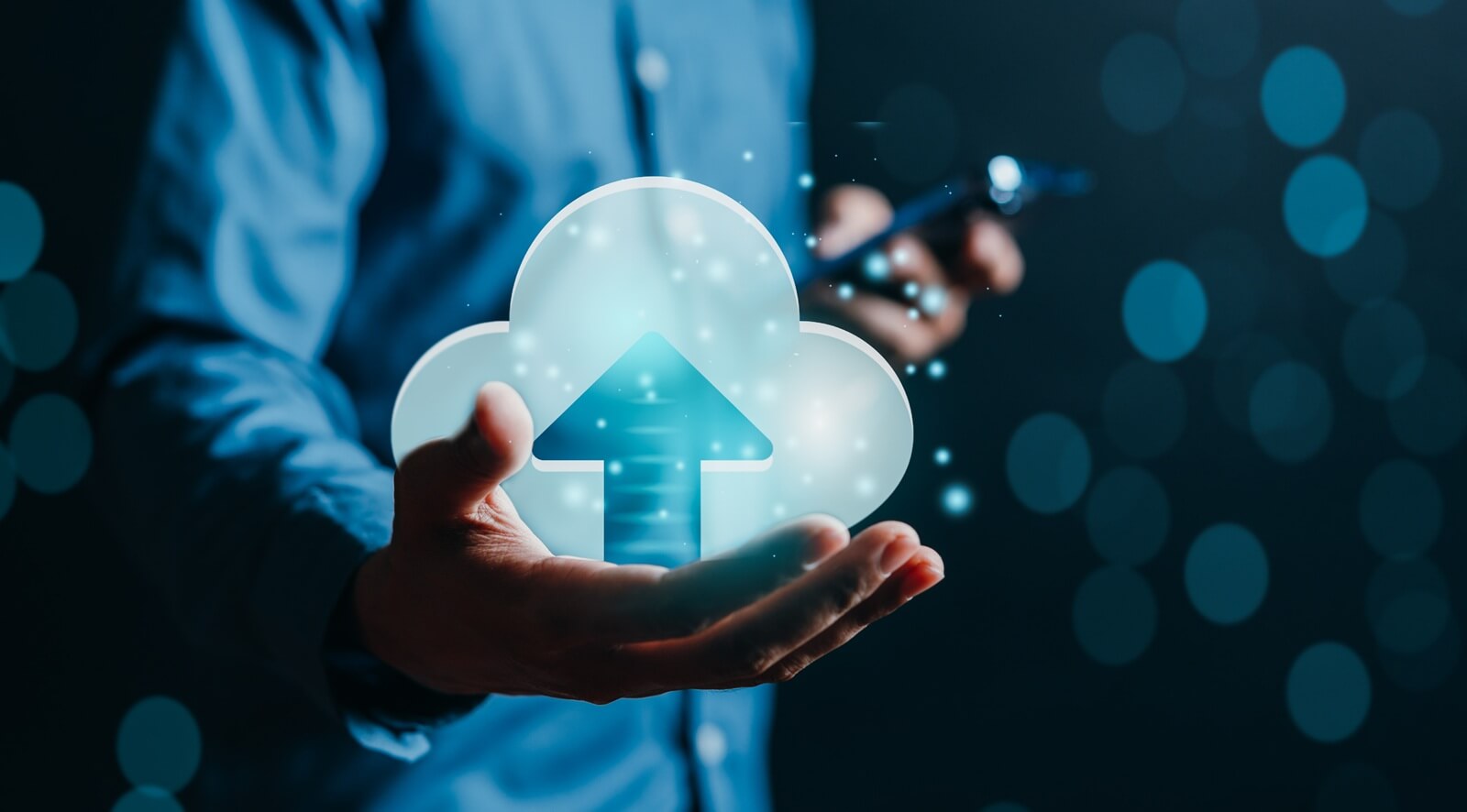 businessman holding virtual glowing cloud computing to download and loading data information and upload on system network application