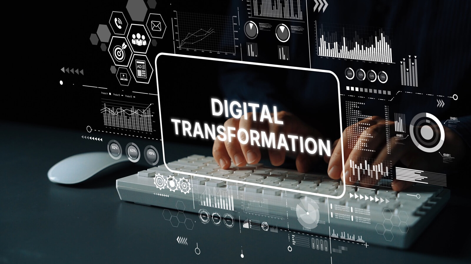 Hands Typing on Keyboard with Digital Transformation Graphics and Data Analytics Background for Technology Concept