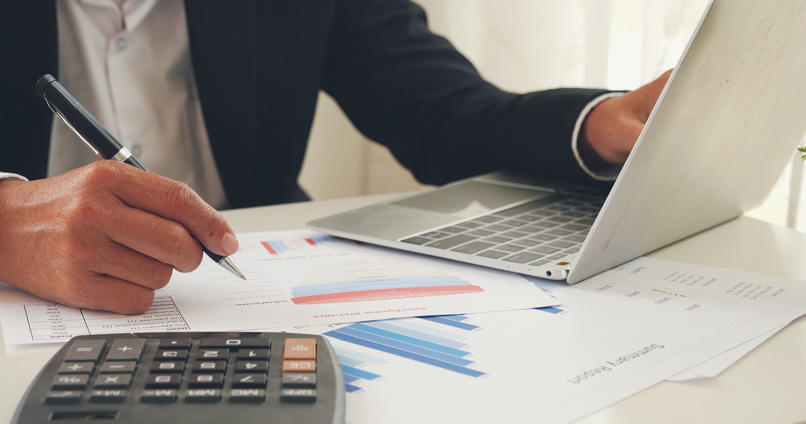 businessman reading financial graph charts color palette Planning analyzing infographic marketing data