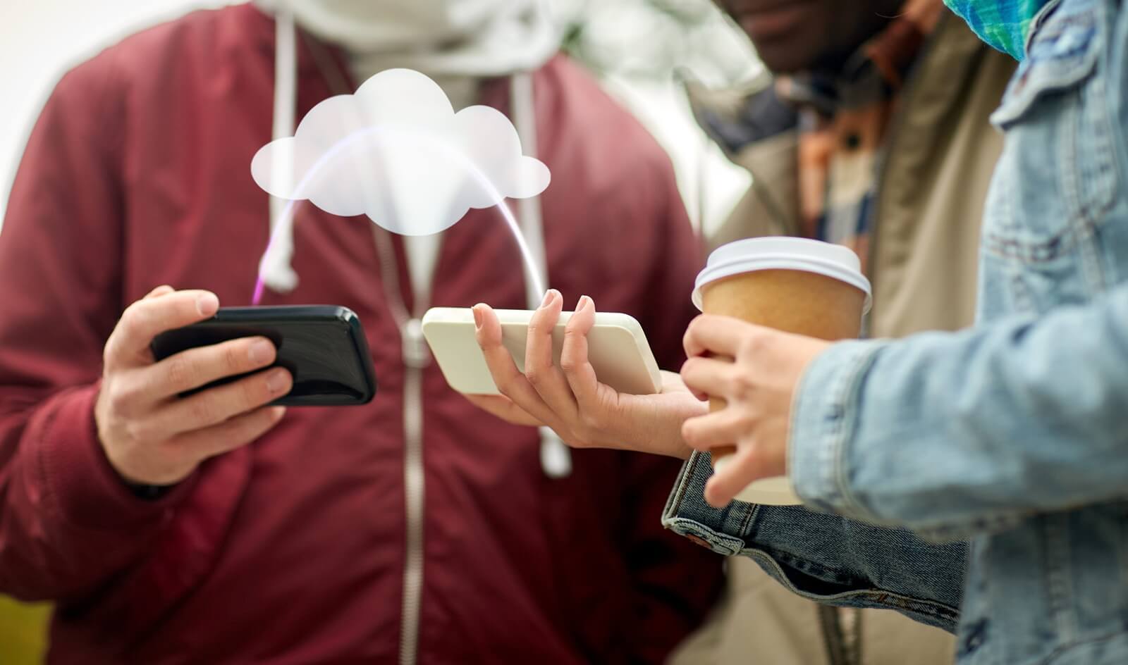 friends transfering data from smartphones