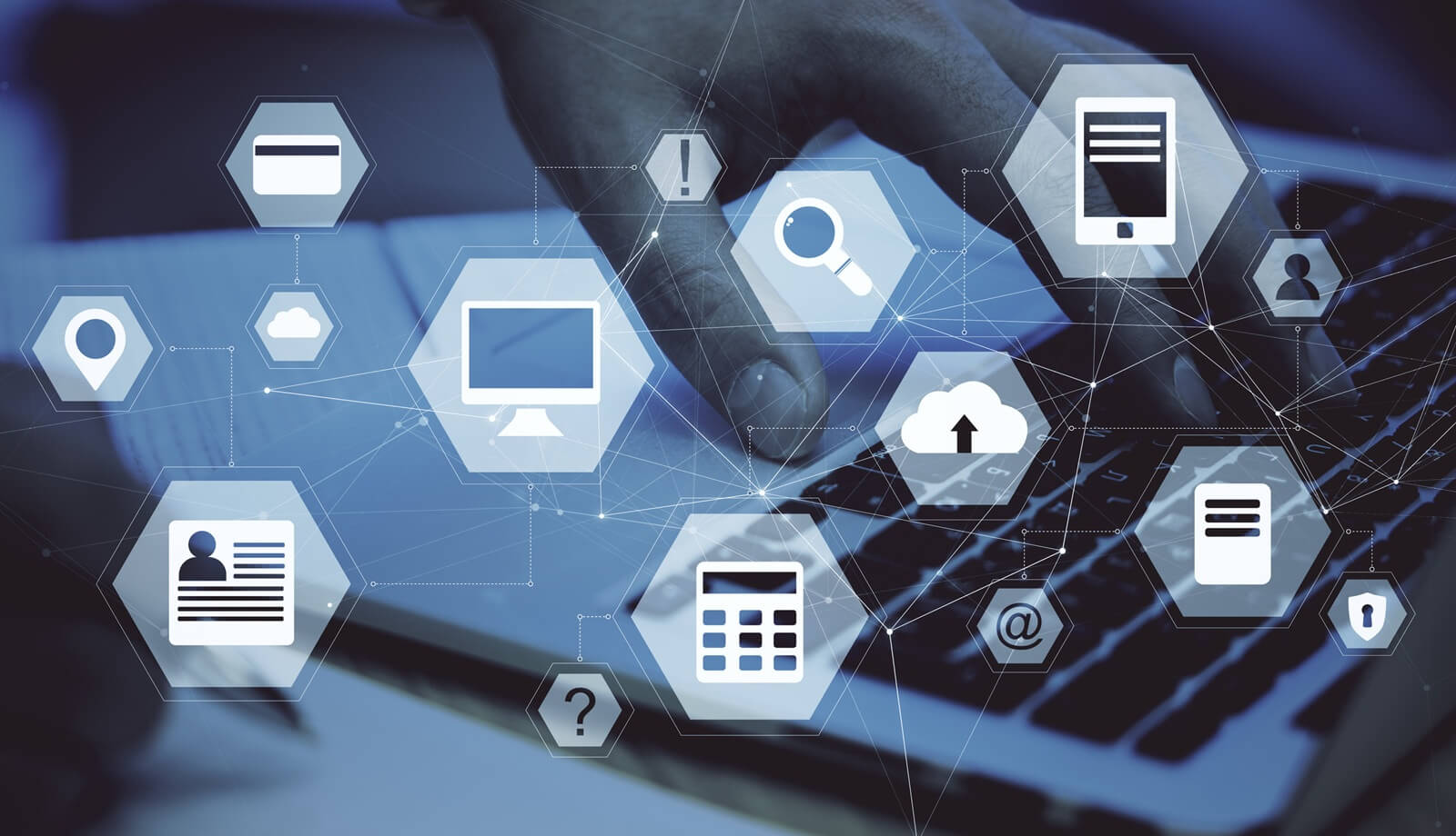 hand using laptop with abstract digital business interface on blurry background