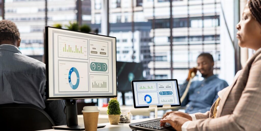 manager in modern office engaged in infographics analysis for problem solving tasks