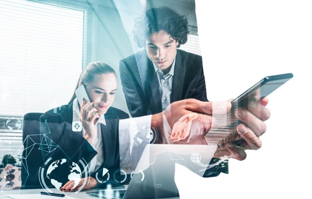 Serious young businessman and attractive businesswoman are working together and having a conference call on laptop