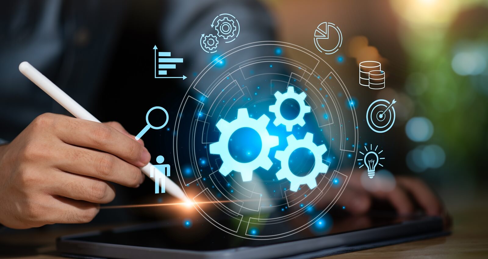 businessman using a digital tablet with glowing gear icons, representing workflow automation