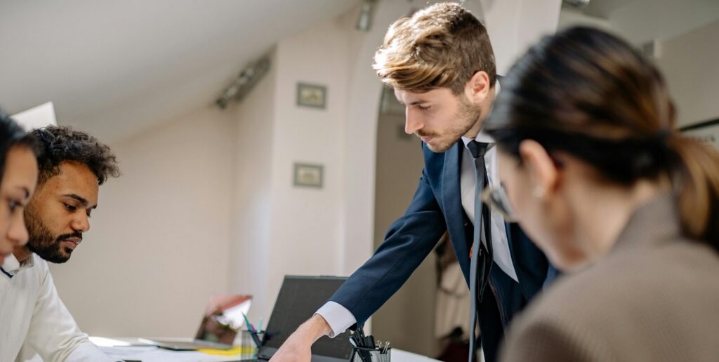 group of business people working together - Benefits of a Business Continuity Plan