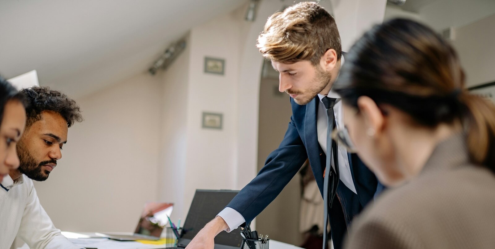 group of business people working together - Benefits of a Business Continuity Plan