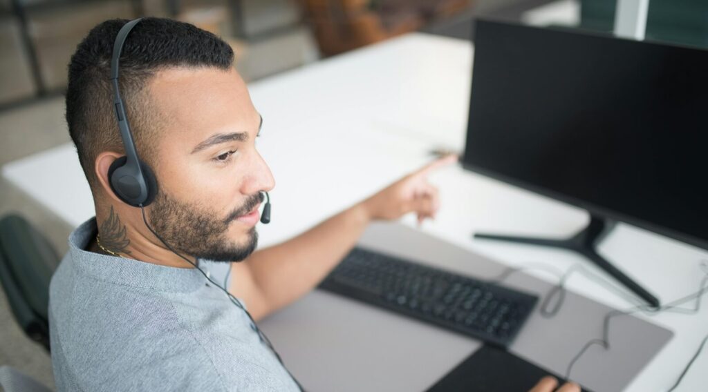 man working with earphones on