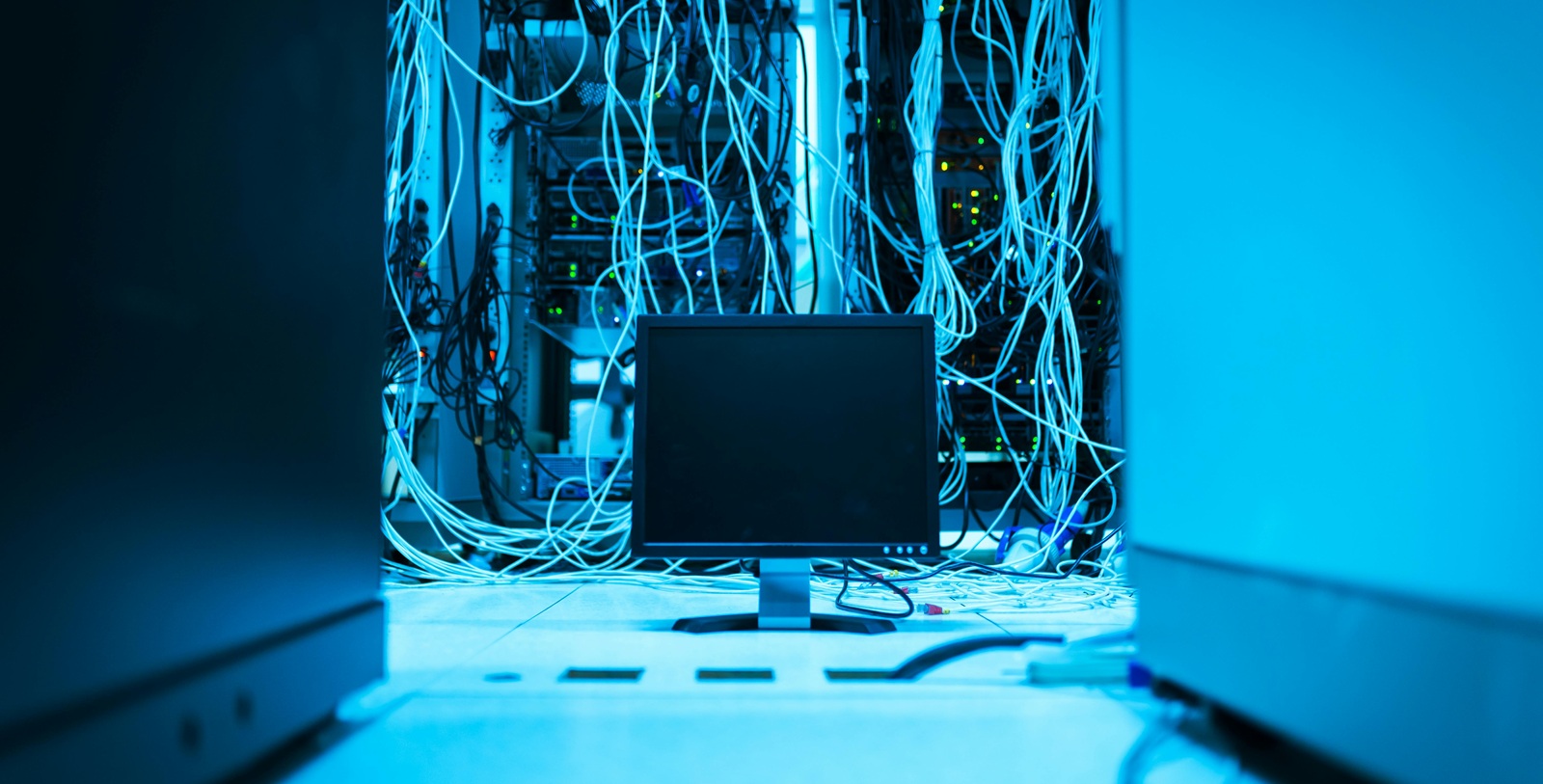 monitor and wires behind