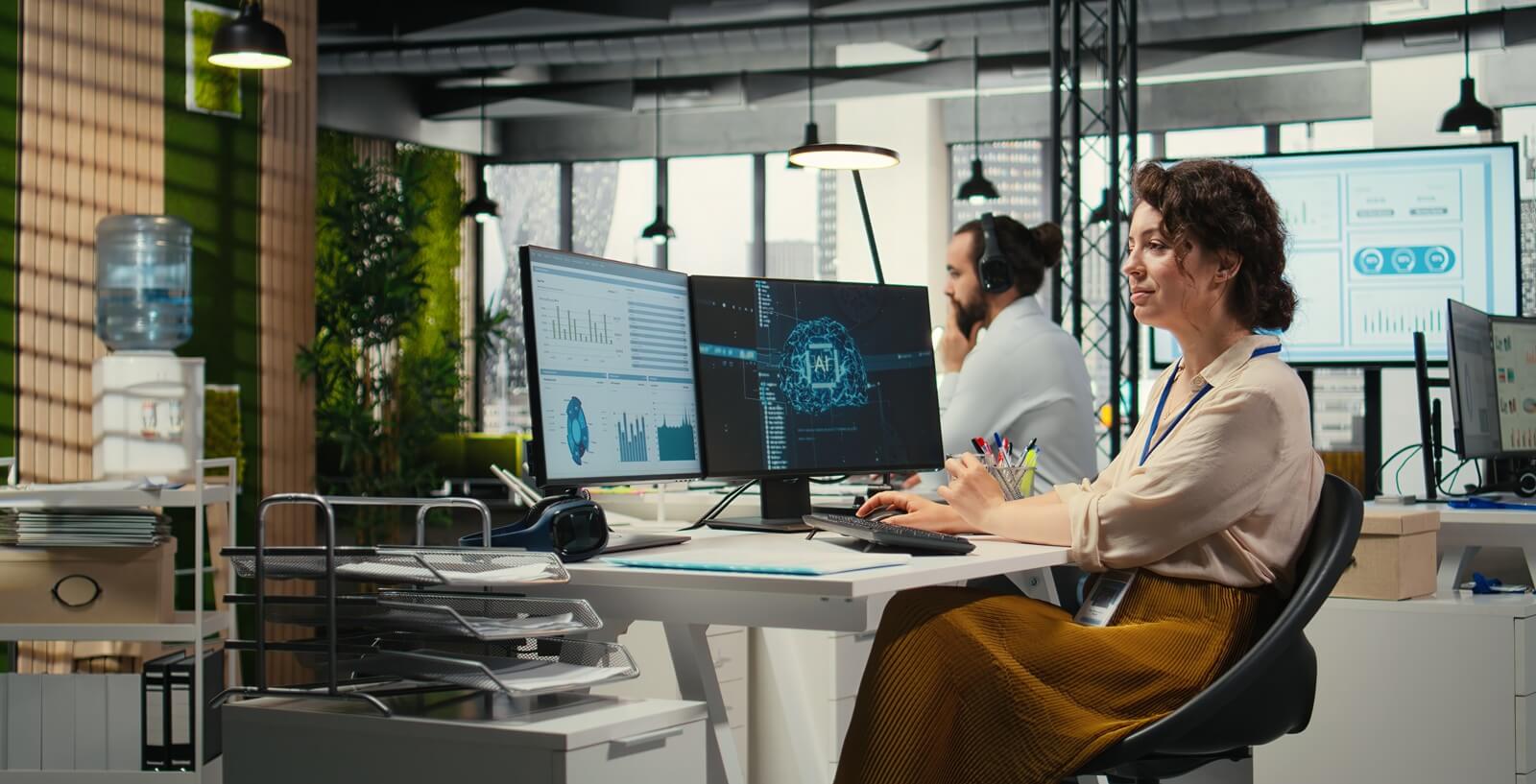 office administrator checking monthly reports with AI analytics platform