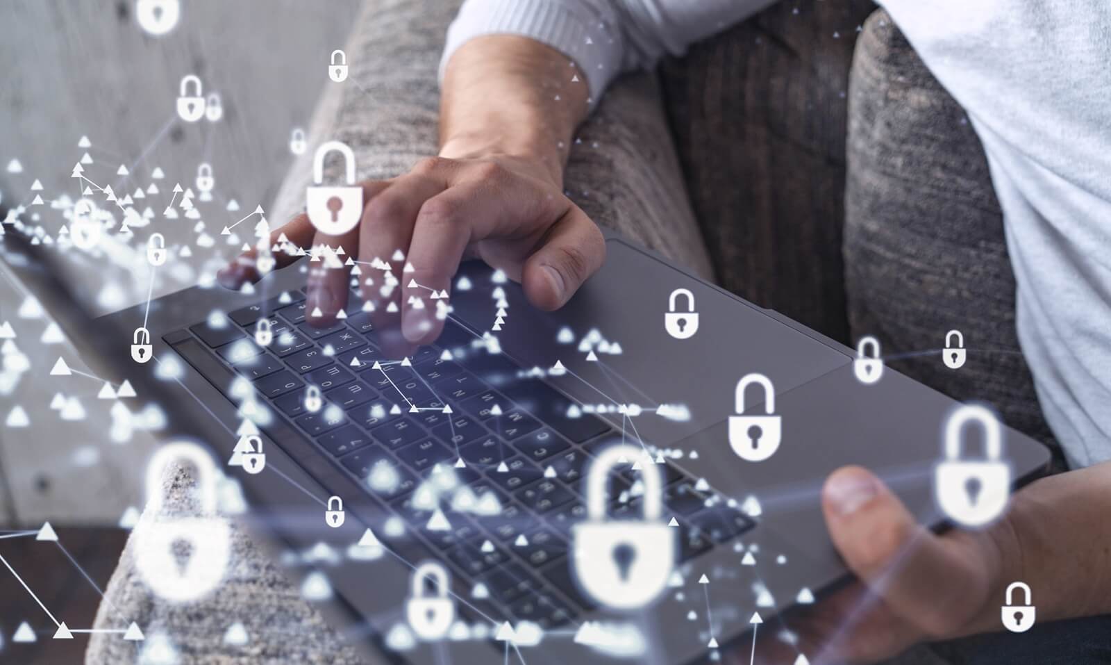 programmer is typing a code on a keyboard to protect a cyber security from hacker attacks and save clients confidential data