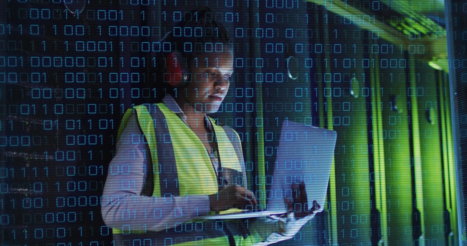 binary coding over african american male it engineer and computer servers