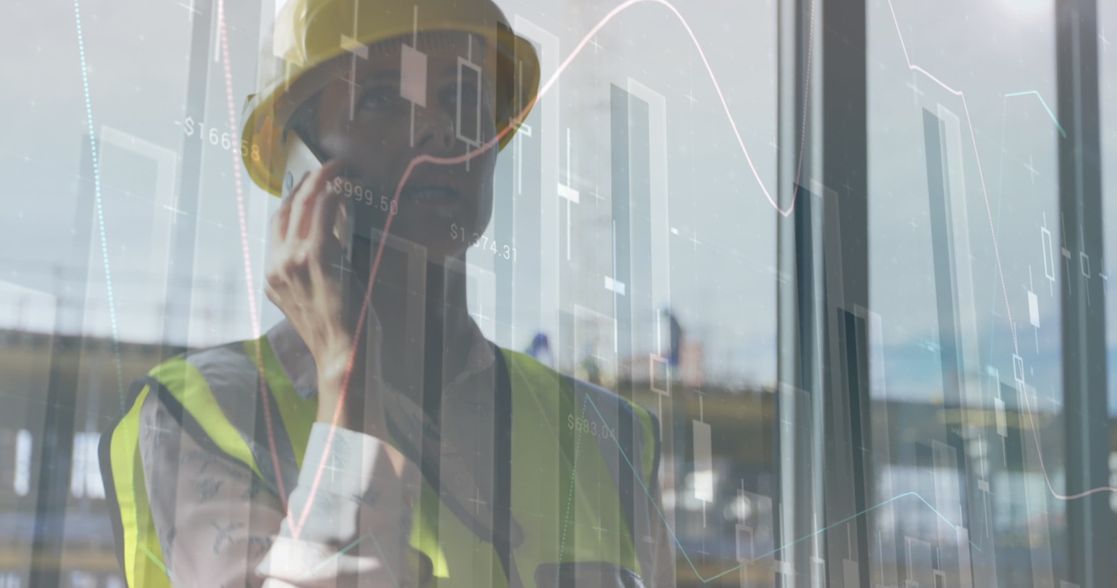 graphs and statistics rolling over Caucasian male worker talking on a phone