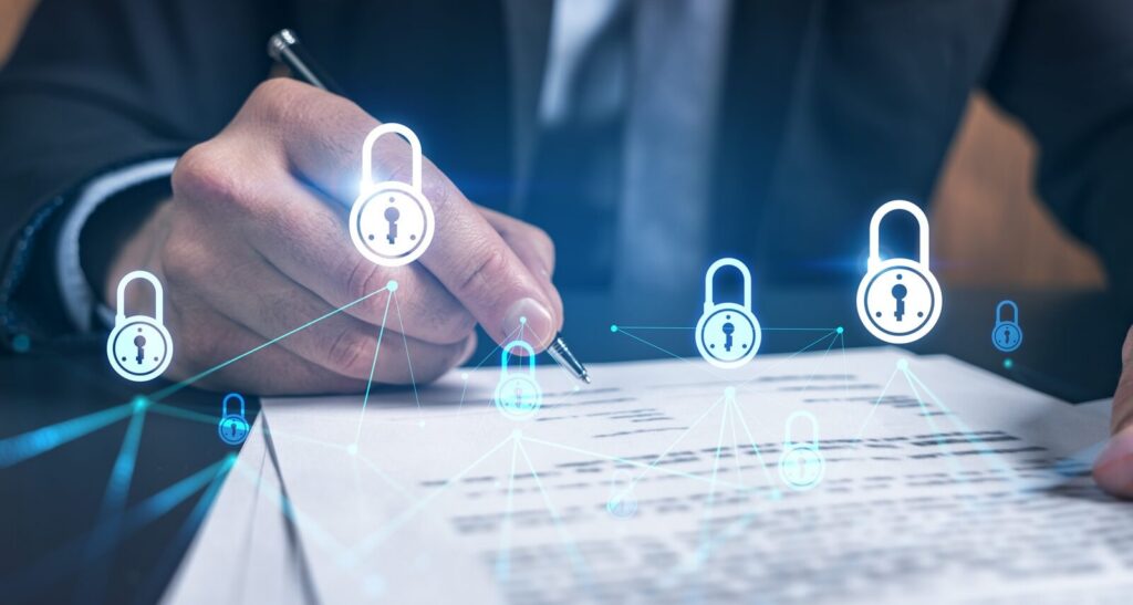 man signing agreement on company data security