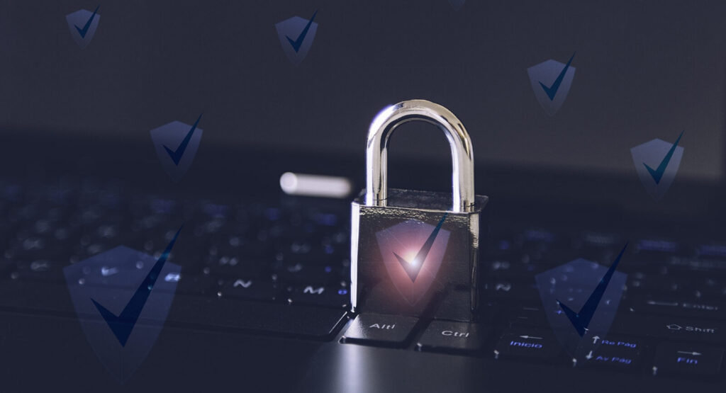 padlock on a computer keyboard - cybersecurity concept