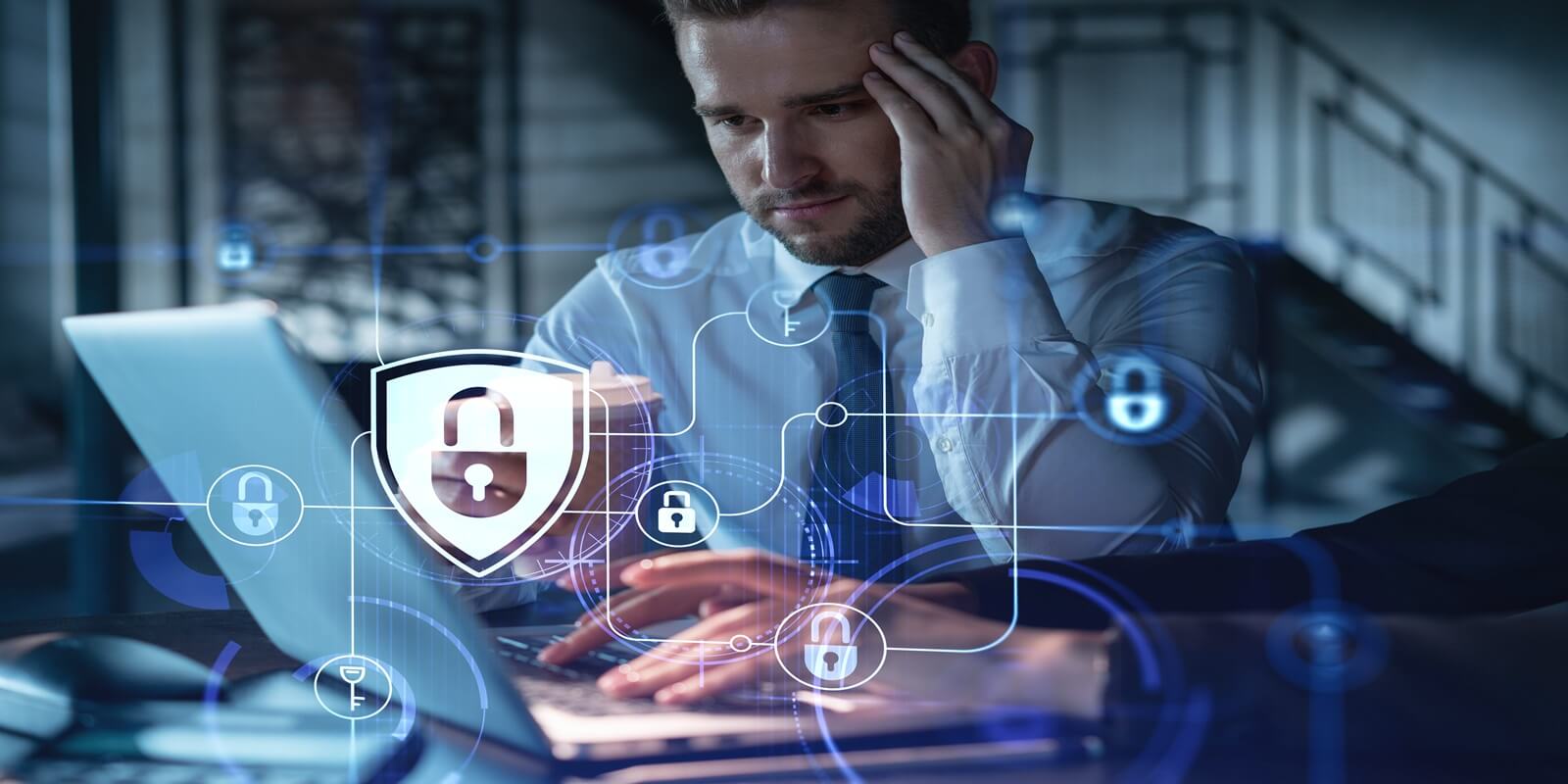 a businessman grapples with the pressures of cybersecurity
