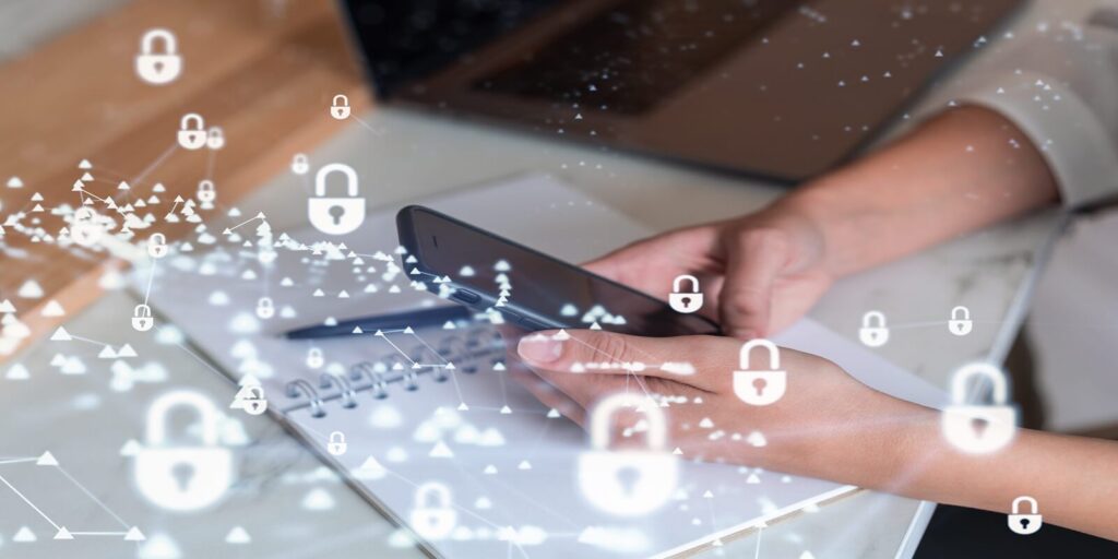 programmer is browsing the Internet in smart phone to protect a cyber security from hacker attacks
