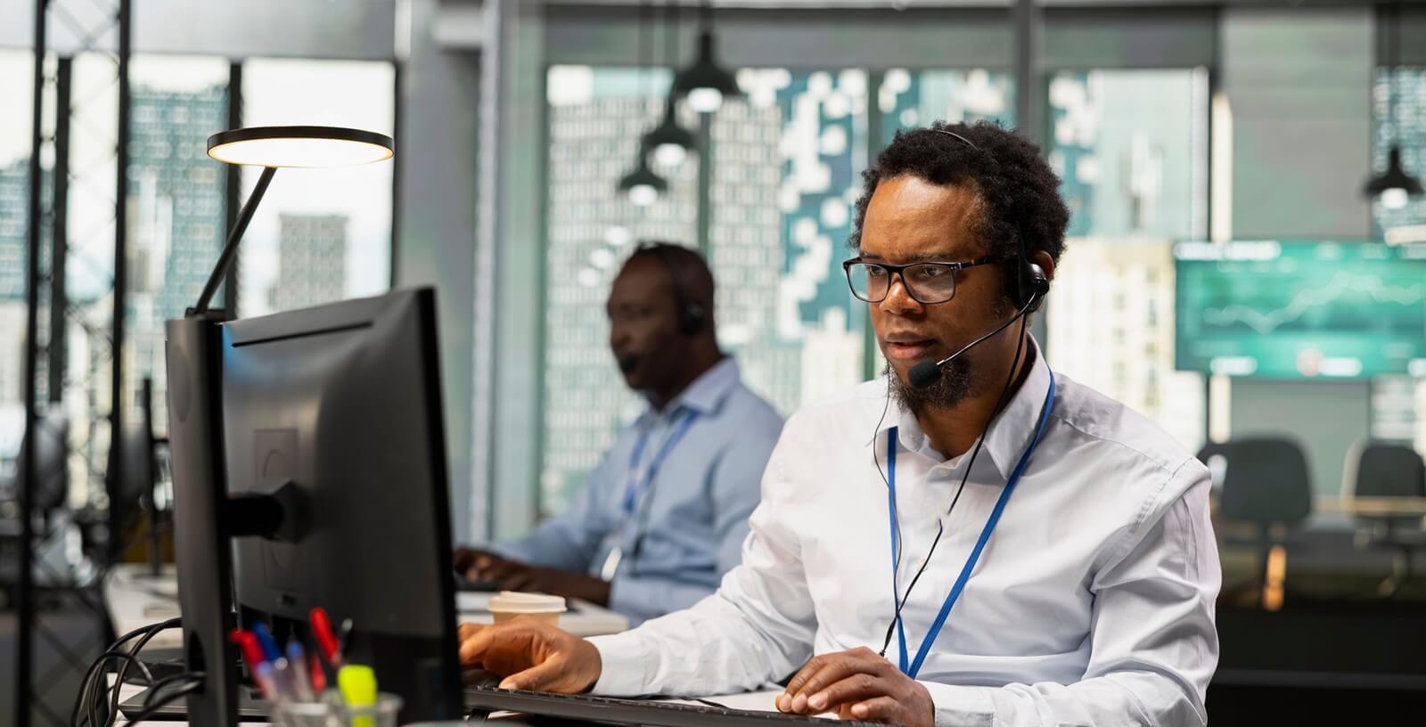 startup system administrator doing tech support, helping users fix errors during remote call
